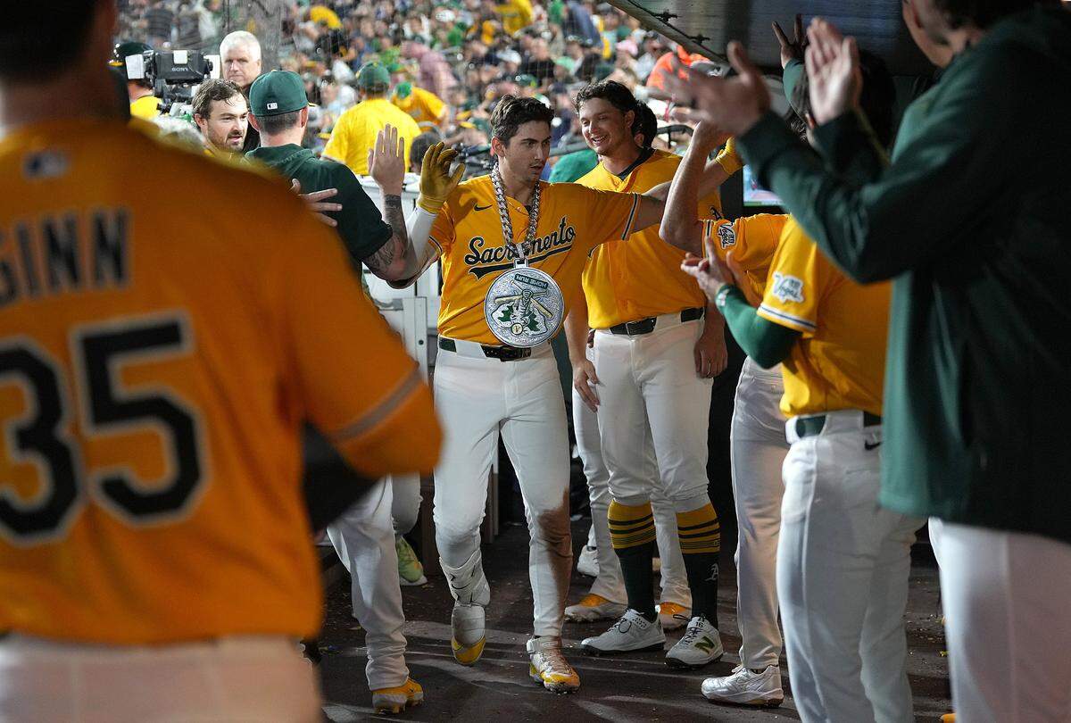 SACRAMENTO, CALIFORNIA - MAY 30: Tyler Soderstrom #21 of the Athletics is congratulated by teammates after hitting a solo home run against the New York Yankees in the bottom of the six inning at Sutter Health Park on May 30, 2026 in Sacramento, California. (Photo by Thearon W. Henderson/Getty Images)