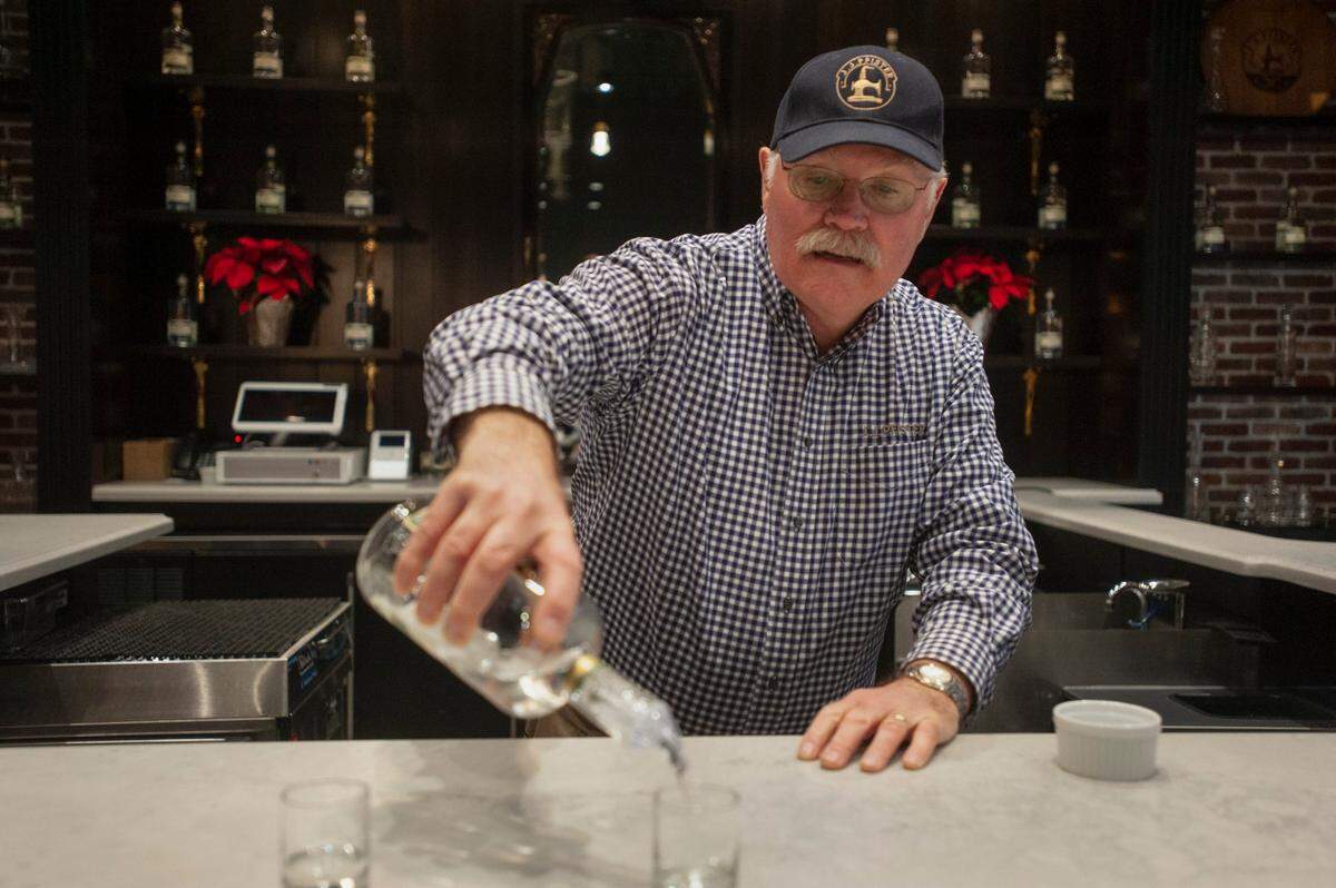 Kevin Keck pours gin in 2018 at J.J. Pfister Distilling, a craft distillery in Rancho Cordova that produces gin, potato vodka and whiskey.
