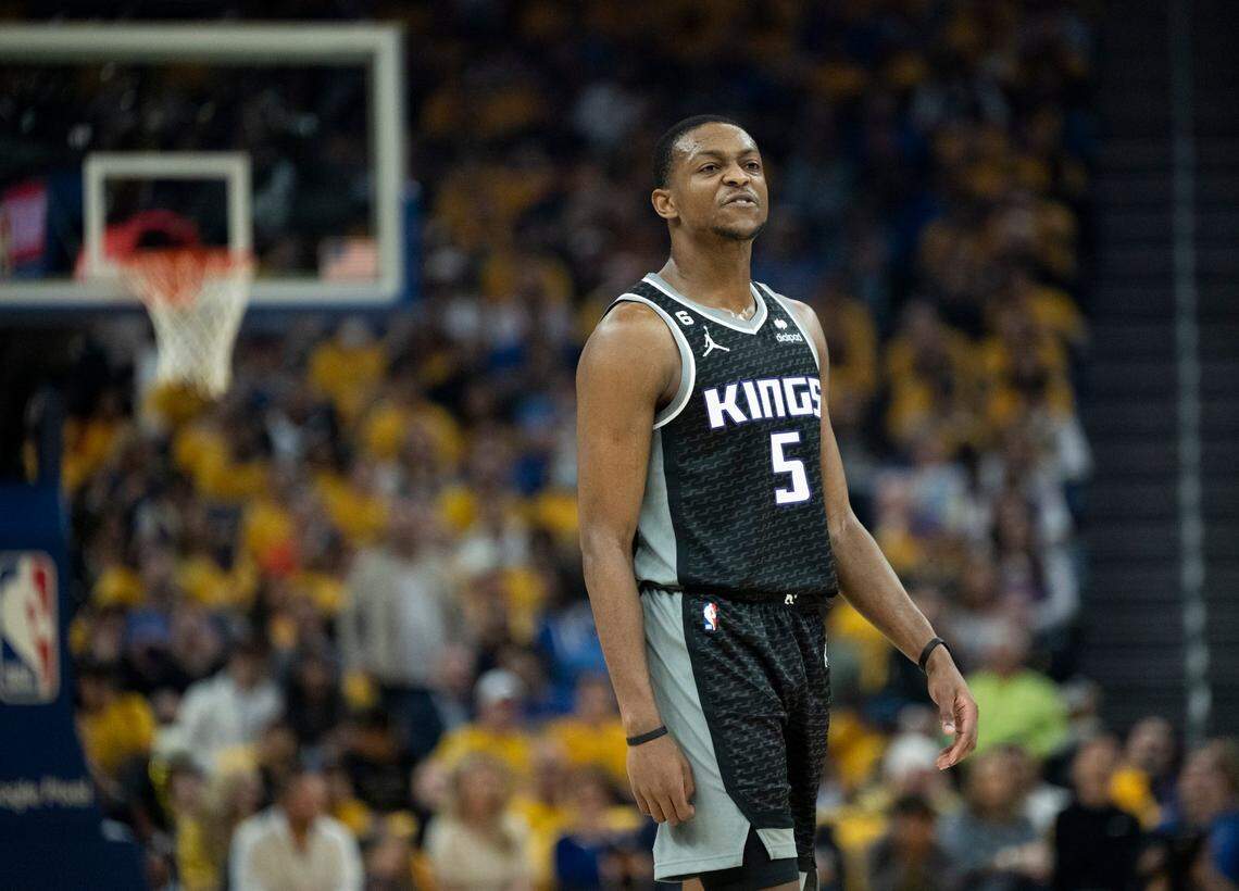 Sacramento Kings guard De’Aaron Fox (5) reacts after foul during Game 4 of the first-round NBA playoff series at Chase Center in San Francisco on Sunday.