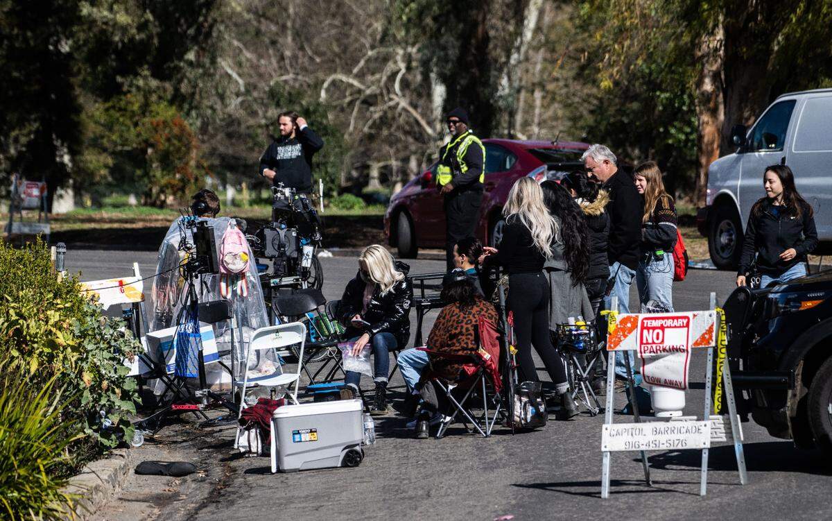 The crew for the movie “No Address” works away from the set as recording was taking place in William Land Park in Sacramento on Wednesday.