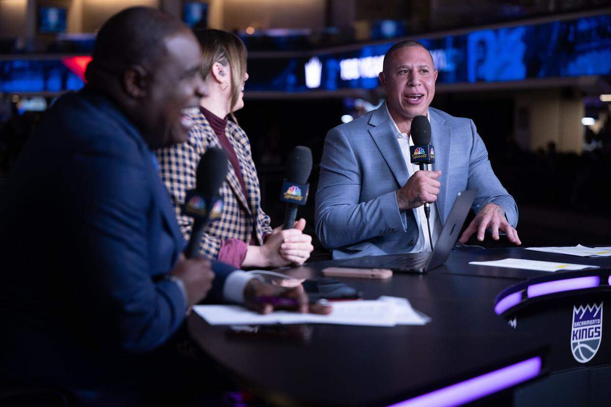 Former Sacramento Kings player Mike Bibby provides commentary alongside hosts Kyle Draper and Morgan Ragan at Golden 1 Center in 2023.