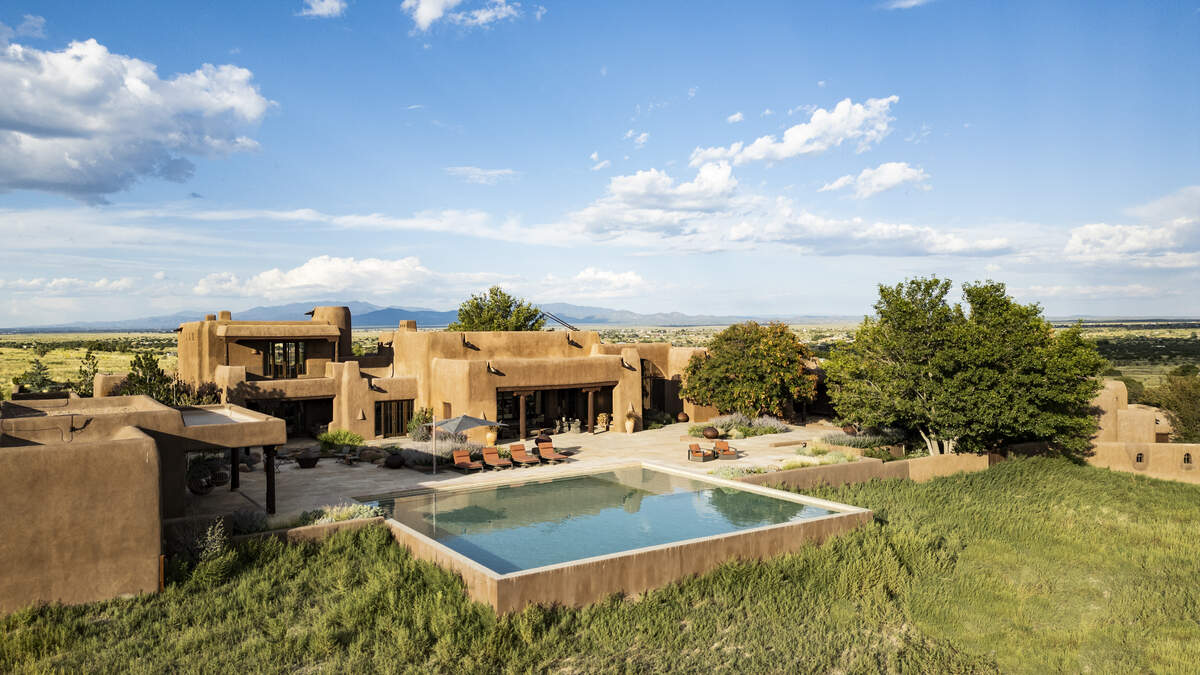 Known as Rancho Alegre, the New Mexico property is the longtime home of Jochen Zeitz, the former chairman and CEO of Harley-Davidson and former CEO of Puma. The spread is a collection of adobe-style buildings that reads like a private Old West village.