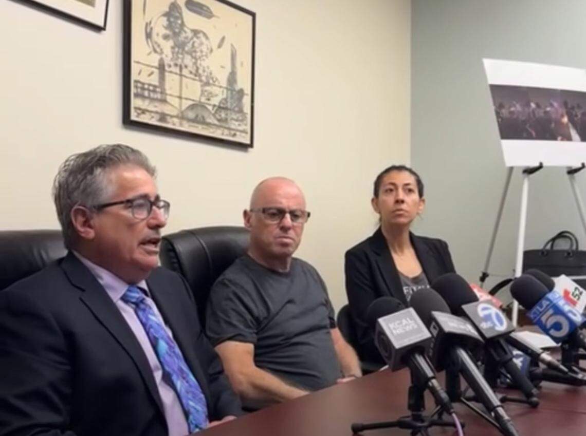 DeSimone (left) and Stern (center) at the June 17 news conference.