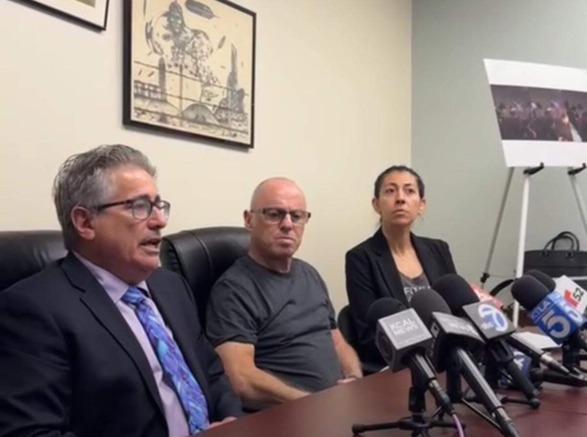 DeSimone (left) and Stern (center) at the June 17 news conference.