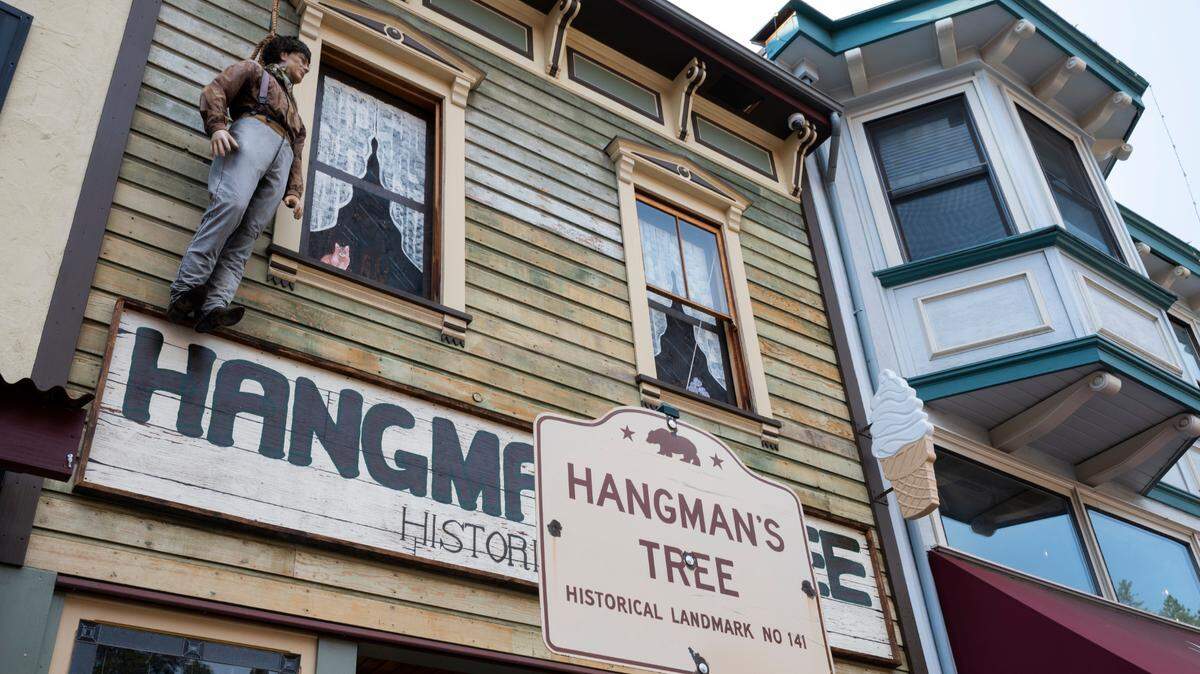 A dummy hangs from a noose above the Hangman’s Tree Saloon in downtown Placerville on Thursday, June 25, 2020. After taking it down following the first week of the protests against police brutality that swept the country in the wake of the police killing of George Floyd, the owner of the shop put the dummy back up last week after a cleaning.