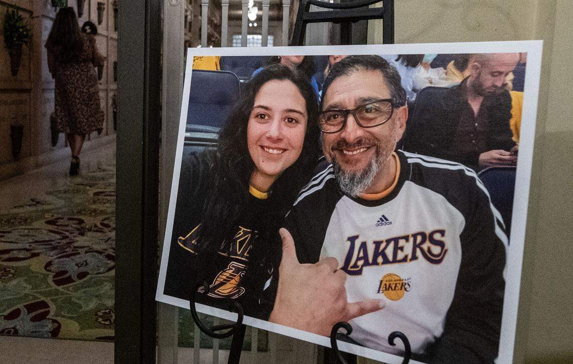 A photo of José Luis Silva with his daughter Madeline Silva stands on display at his funeral Friday, Sept. 6, 2024, at East Lawn Cemetery in Sacramento. The driver who killed him received a light sentence this month.