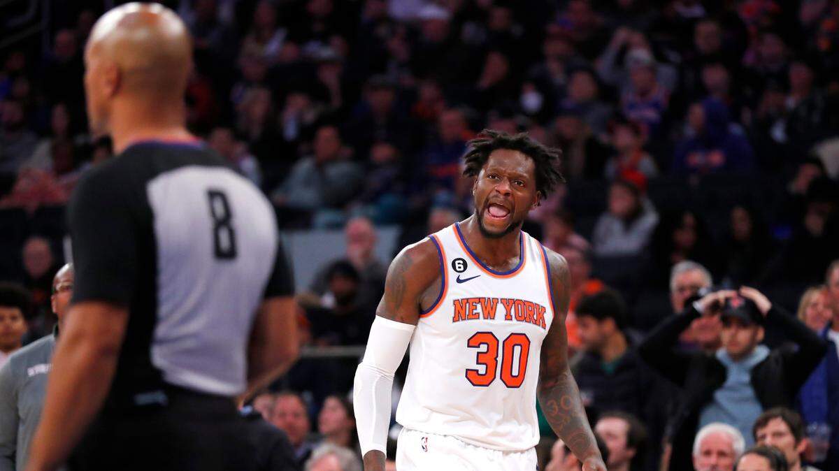 New York Knicks forward Julius Randle (30) talks to referee Marc Davis (8) after being ejected during the second half of an NBA basketball game against the Sacramento Kings , Sunday, Dec. 11, 2022, in New York. The New York Knicks won 112 - 99. (AP Photo/Noah K. Murray)