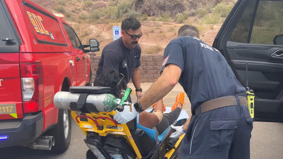 A group of women visiting Phoenix needed to be rescued from Camelback Mountain in 100-degree heat on June 23, 2022, fire officials said.