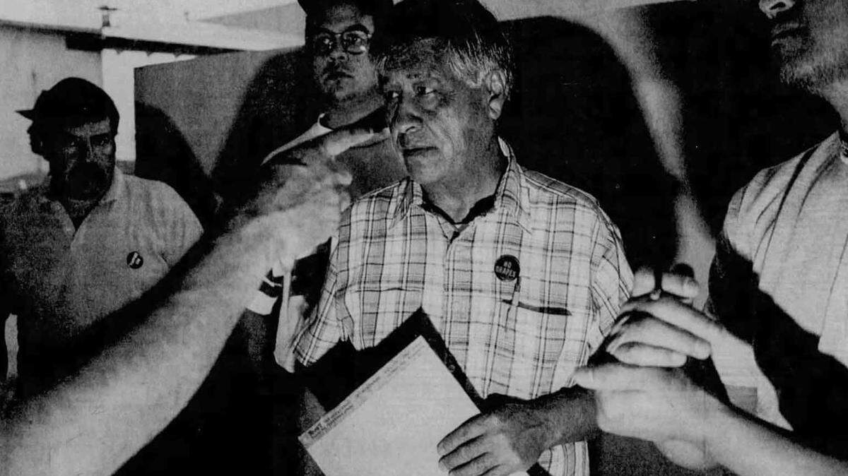 Labor leader Cesar Chavez with United Farm Workers members in Coachella in 1991.