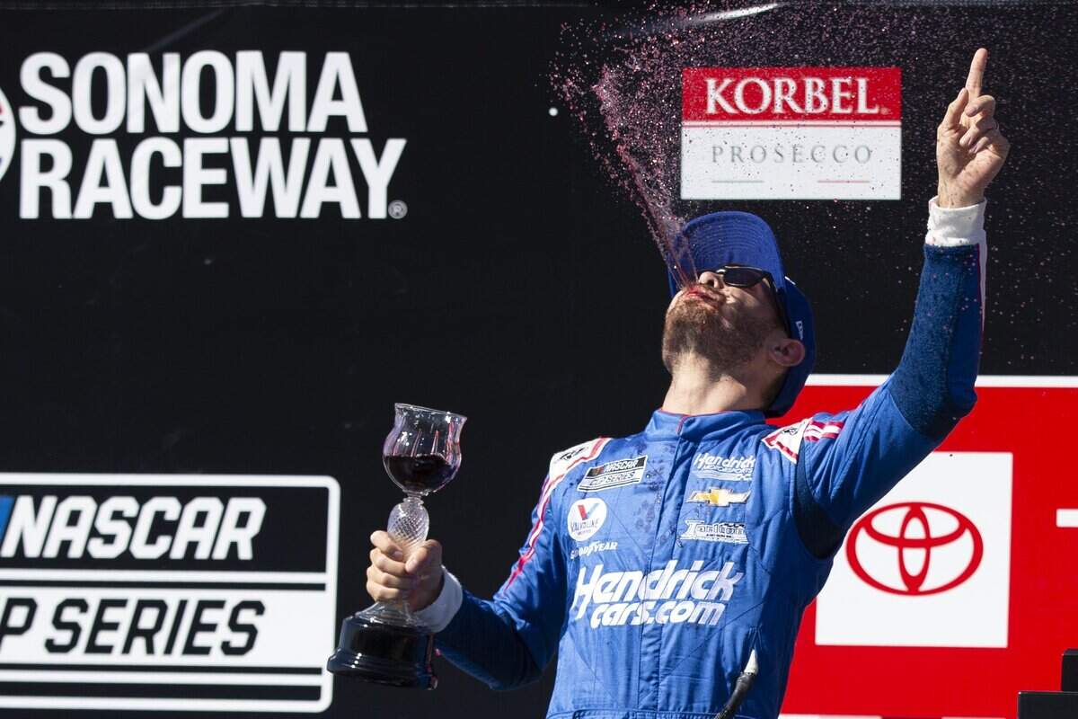 Elk Grove’s Kyle Larson celebrates his victory in the NASCAR Cup Series Toyota/Save Mart 350 at Sonoma Raceway on Sunday in Sonoma.