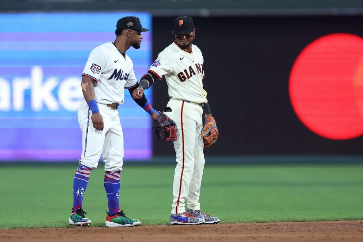 PHILADELPHIA, PENNSYLVANIA - JULY 14: Otto Lopez #6 of the Miami Marlins and Luis Arraez #1 of the San Francisco Giants embrace during the sixth inning of the 2026 MLB All-Star Game at Citizens Bank Park on July 14, 2026 in Philadelphia, Pennsylvania. (Photo by Emilee Chinn/Getty Images)