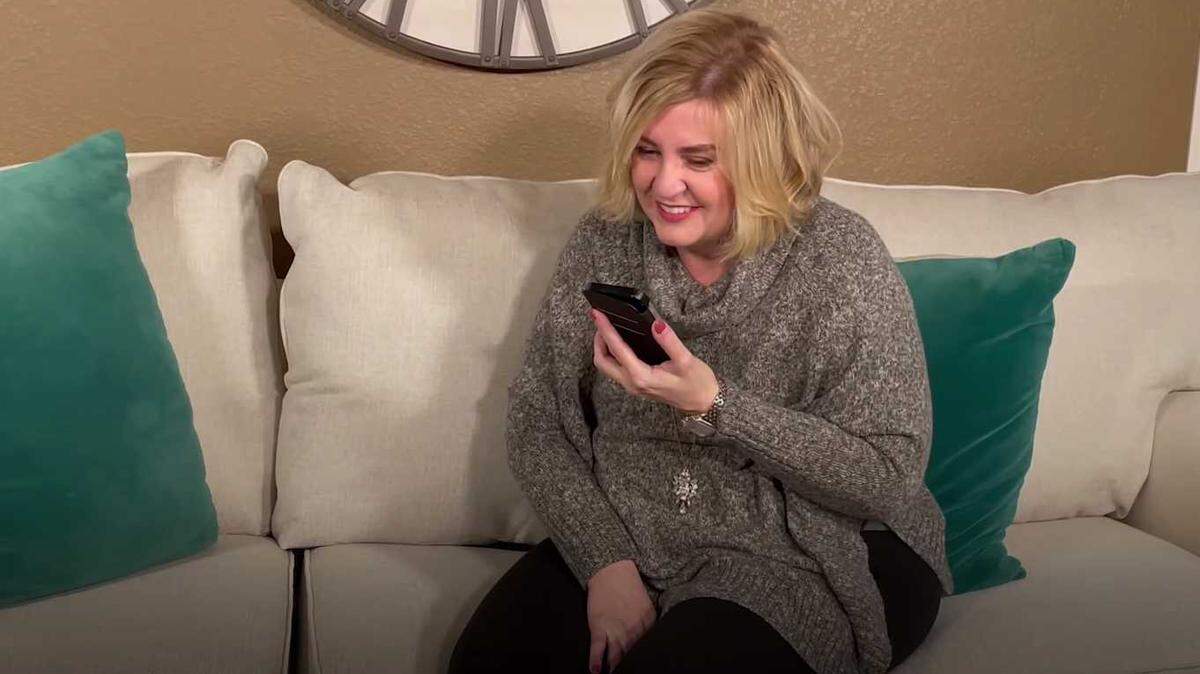 In a image from video provided by the White House, Roseville resident Michele Voelkert talks with President Joe Biden for his first weekly address. The video was posted Saturday morning on YouTube.