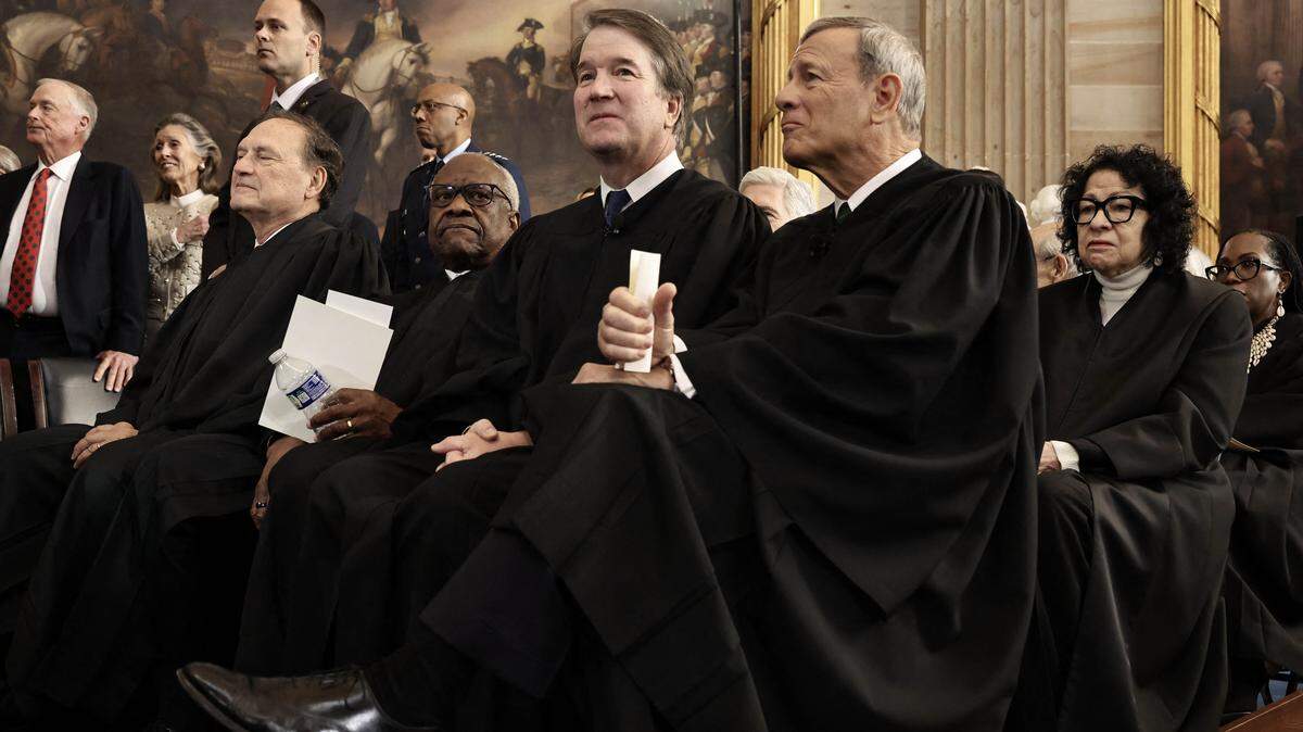 Supreme Court Justice Brett Kavanaugh, center left, and Chief Justice John Roberts, center right, attend the inauguration ceremony with their fellow justices as Donald Trump speaks after being sworn in as the 47th president on Jan. 20. The court heard a Louisiana redistricting case earlier this month that could reshape voting rights across the country.