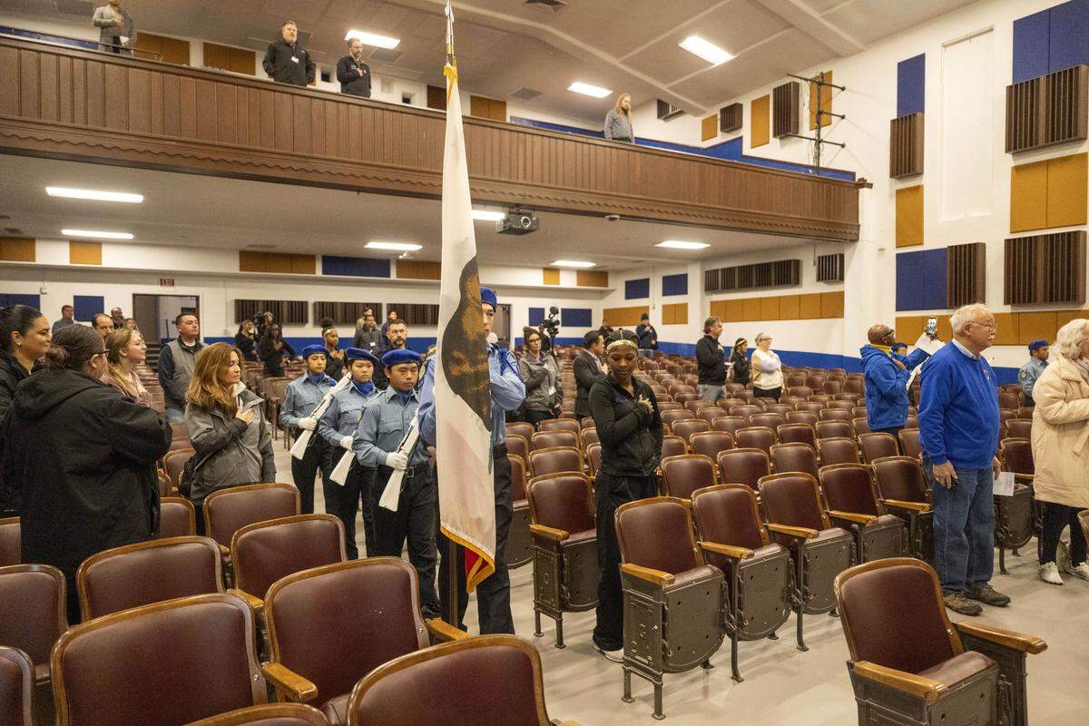 Grant Union High School Criminal Justice Academy students present the colors in the restored auditorium on Monday.