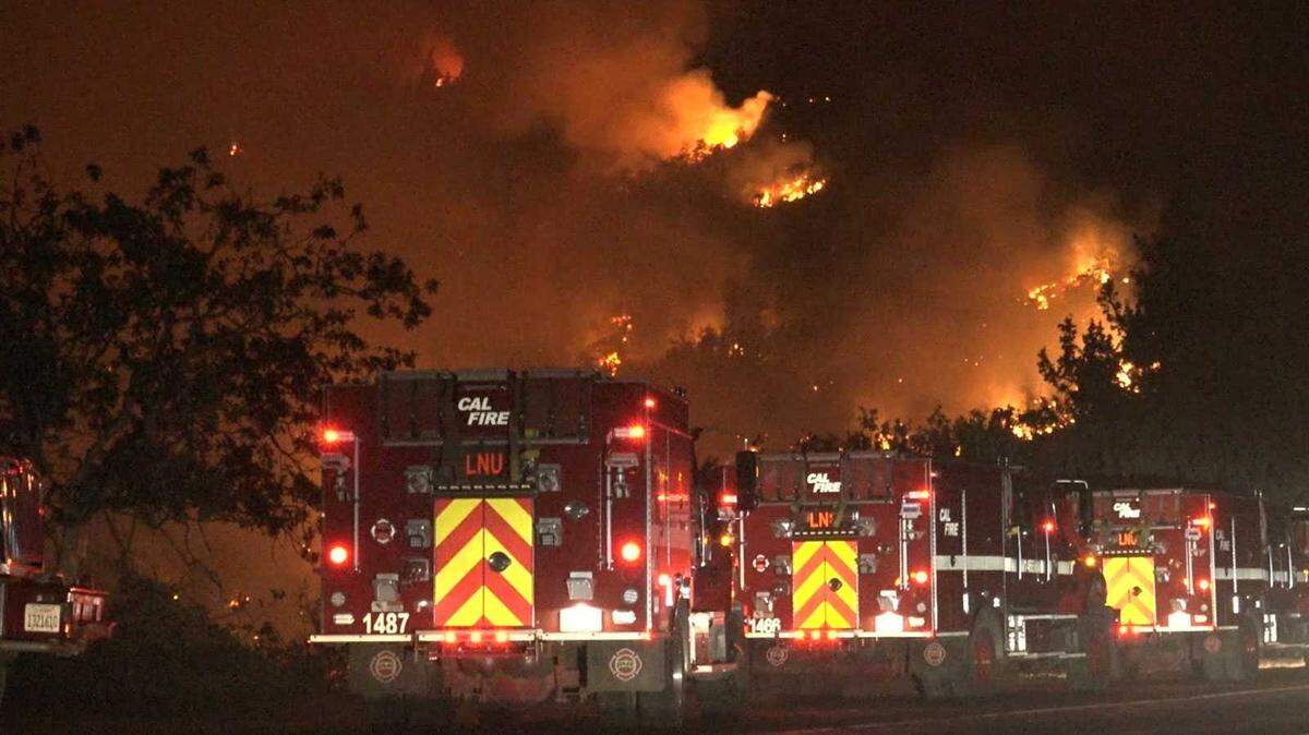 Two killed in Mill Fire as firefighters battle punishing weather in Northern California blazes