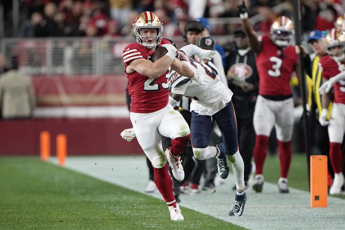 SANTA CLARA, CALIFORNIA - DECEMBER 28: Christian McCaffrey #23 of the San Francisco 49ers runs against Nahshon Wright #26 of the Chicago Bears during the first quarter of the game at Levi's Stadium on December 28, 2025 in Santa Clara, California. (Photo by Thearon W. Henderson/Getty Images)
