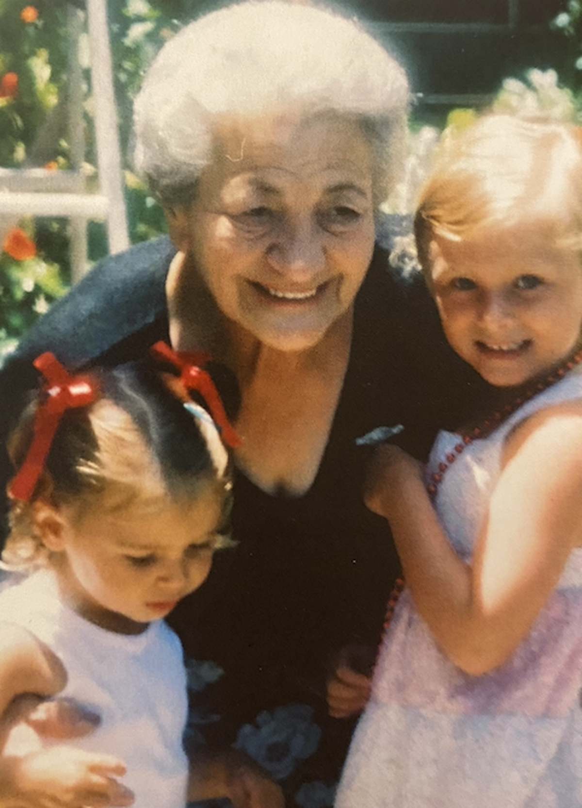 The author with her sister, Maddie Haddad, and grandmother, Samira Atiya Al-Hadad.