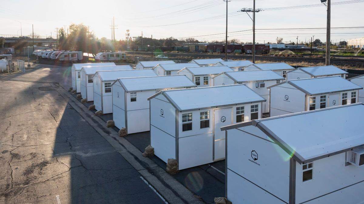 Tiny houses and trailers sit ready at Sacramento’s tiny homes shelter for homeless Jan. 5 in North Sacramento. Sacramento County on Tuesday approved a $26 million with the Behavioral Health Bridge Housing program to address housing needs of those experiencing homelessness with serious behavior health conditions.