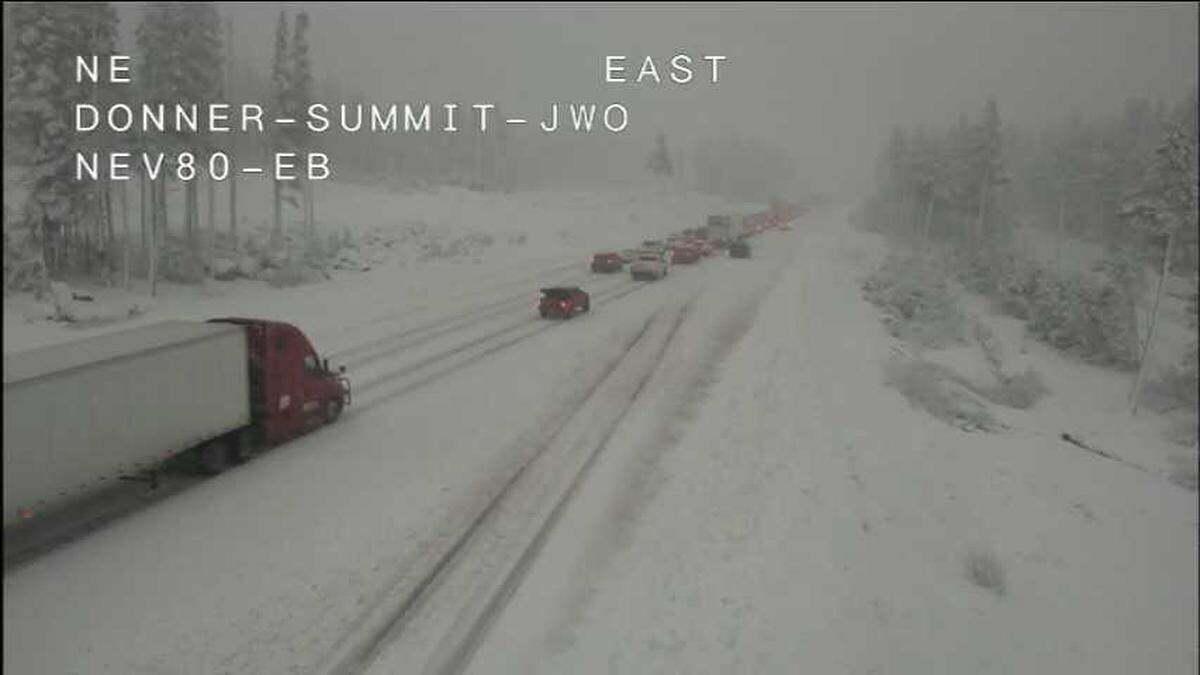 Traffic backs up on eastbound Interstate 80 at Donner Summit on Wednesday, Dec. 24, 2025, as seen from a Caltrans camera.