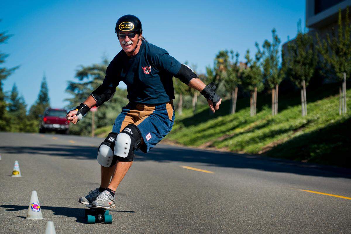 Jamie Hart, a N Men original member and slalom skateboarding World Champion, trains on a small hill in Fair Oaks in 2013.