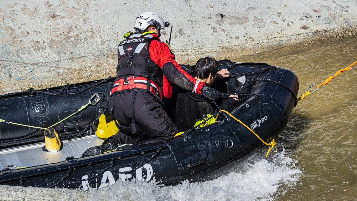 A man was rescued after he fell into a wash and was swept away by swift-moving storm water, California fire officials said.