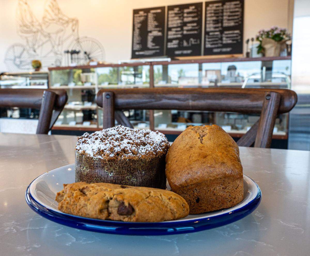 The blueberry cinnamon coffee cake, left, banana bread, right, and chocolate chip cookie at Pushkin’s Bakery & Cafe in Arden Arcade. The bakery offers a wide array of pastries on its menu, all of which are gluten- and dairy-free.