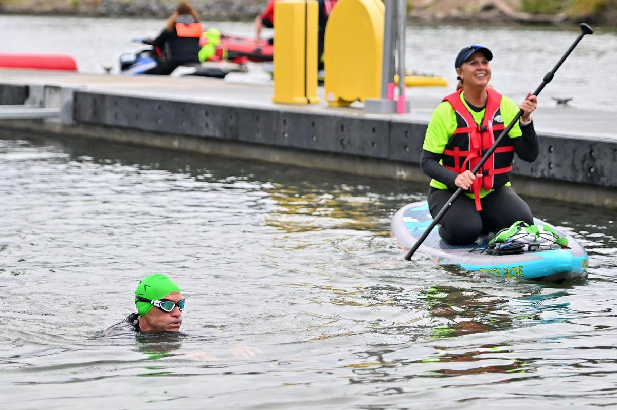 Kirk White, of American Fork, Utah, finishes the swim portion during the Ironman California triathlon on Sunday.
