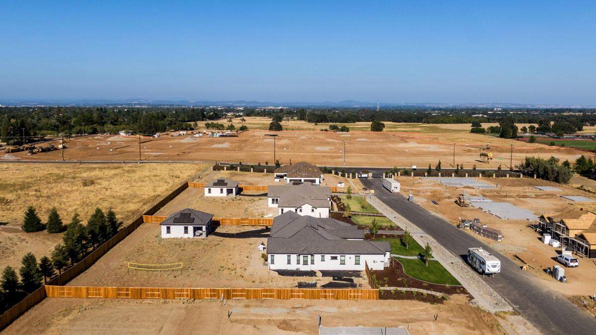 Houses are under construction in Dry Creek last month Cook Riolo Road south of Vineyard Road near a proposed 37 acre development.