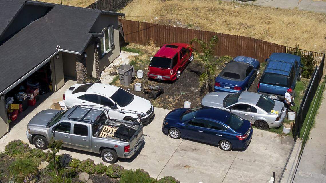 The house Sacramento City Councilman Sean Loloee owns, and has used as his home address to vote, is seen with several vehicles on the property on June 16 in the Hagginwood neighborhood of Sacramento.