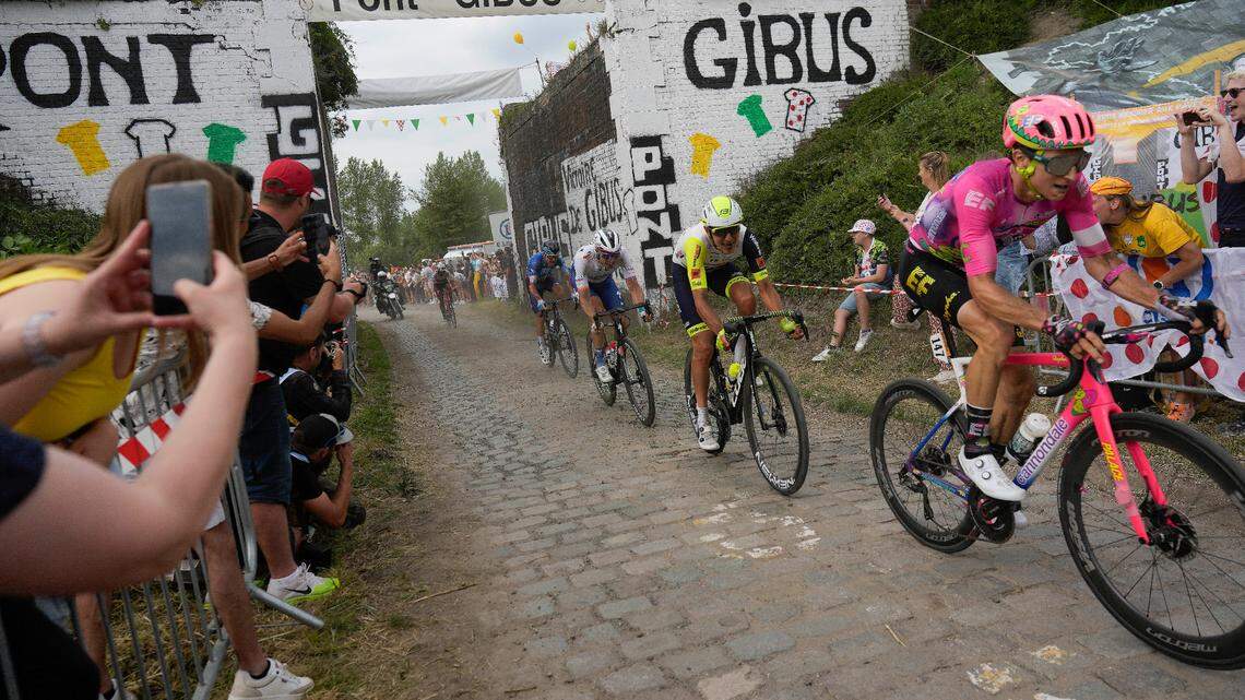Neilson Powless leads a pack of riders over the cobblestones during the fifth stage of the Tour de France on Wednesday, July 6, 2022.