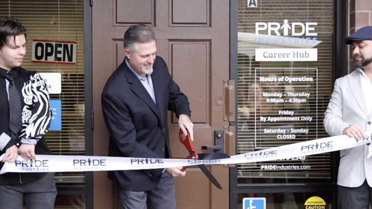 Gabriel Windsor, left, PRIDE Industries chief executive officer Jeff Dern and Carlos Perez, a workforce inclusion manager for the organization’s new program, Youth Employment Services, cut the ribbon at the Sylvan Road career hub in Citrus Heights on Jan. 12. The YES program aims to assist people ages 16 to 24 who have disabilities or who have spent time in poverty or the child welfare, juvenile justice or criminal legal systems in finding full- or part-time employment.