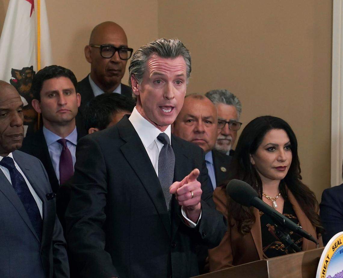 California Gov. Gavin Newsom discusses the recent mass shooting in Texas, during a news conference in Sacramento, Calif., Wednesday, May 25, 2022. Flanked by lawmakers from both houses of the state legislature, Newsom said he is ready to sign more restrictive gun measures passed by lawmakers.