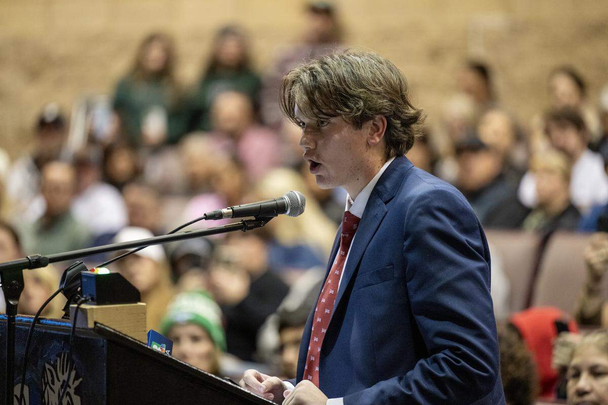 Twelve Bridges High School student Garrett Culp, the president of the school’s Club America chapter, addresses the Western Placer Unified School District board at Lincoln High School on Tuesday.