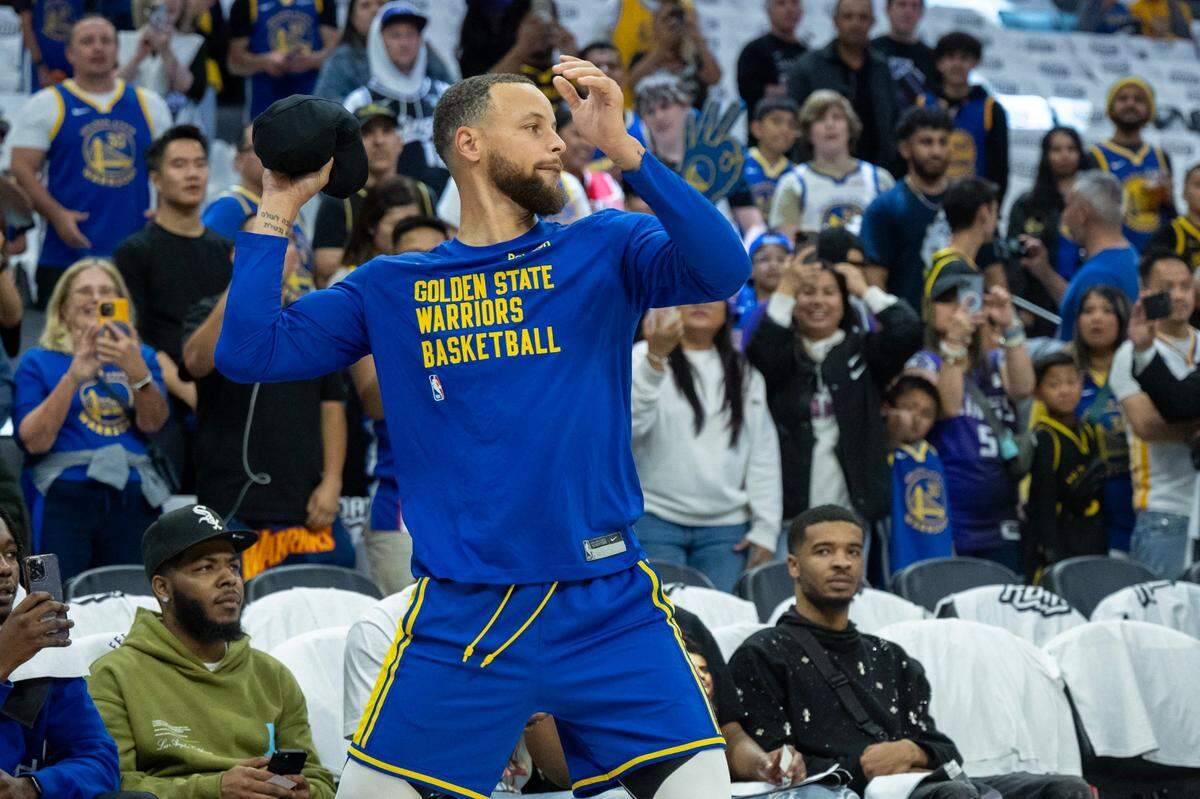 Golden State Warriors guard Stephen Curry (30) throws his warm up jersey like a football before a NBA play-in game at Golden 1 Center on Tuesday, April 16, 2024. Curry will participate in the NBA All-Star Game at Chase Center in San Francisco on Sunday, Feb. 16, 2025.