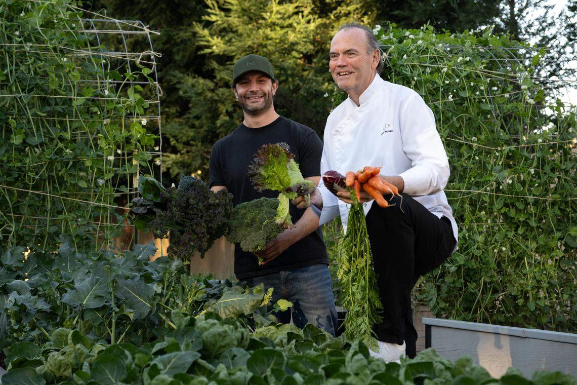 Chef Charlie Palmer poses for a photo with Matt Jones of Honest Acre Farm on Jan. 8 in Lodi. Palmer incorporates produce from local farmers like Jones into the cuisine at Appellation Lodi - Wine & Roses Resort and Spa.