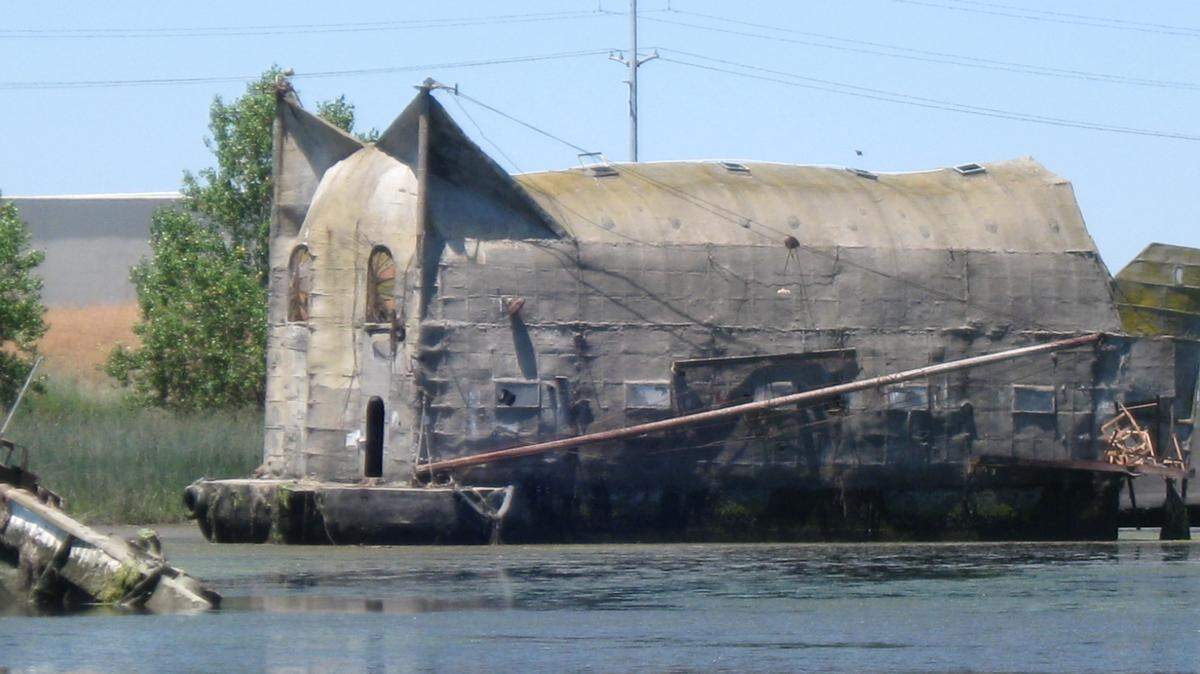 For about 25 years, a dilapidated barge — known to some as the “cat barge” — was floating in West Sacramento’s Upper Lake Washington. It was removed in 2017 as part of a grant-funded derelict vessel clean-up project.