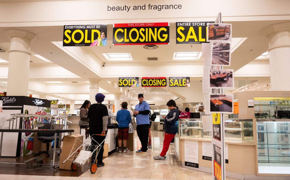 Customers look for bargains at the Downtown Commons Macy’s store in Sacramento on Thursday.