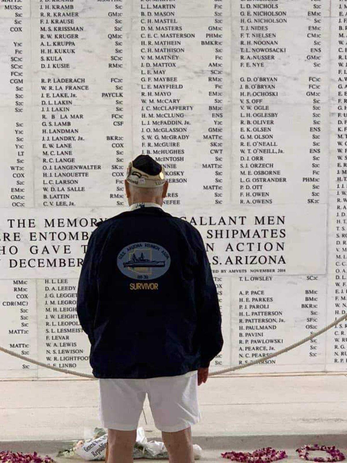 Lou Conter views the memorial wall of victims at the Pearl Harbor National Memorial during one of his many treks to the hallowed ground that triggered World War II. Conter, the last survivor of the attack by the Japanese on the USS Arizona, died Monday at the age of 102, surrounded by family in Grass Valley.