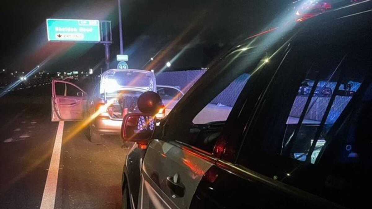 A Galt, California, police officer inspects a vehicle’s trunk after a pursuit Saturday that began in Galt and finally ended along Highway 99 in Elk Grove.
