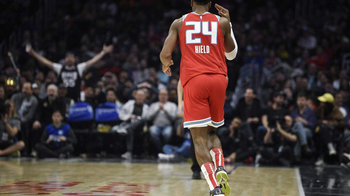 Sacramento Kings guard Buddy Hield reacts after making a three-point shot during the second half of an NBA basketball game against the Los Angeles Clippers in Los Angeles, Thursday, Jan. 30, 2020. The Kings won 124-103. (AP Photo/Kelvin Kuo)