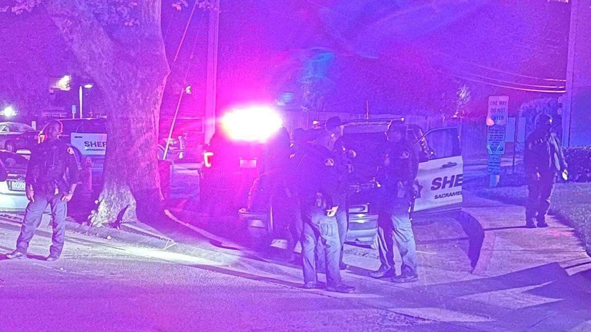 Deputies are seen at the scene of a shooting Wednesday morning on the 500 block of Pine Garden Lane in Arden Arcade after a 17-year-old was shot. The teen is expected to recover, deputies said.