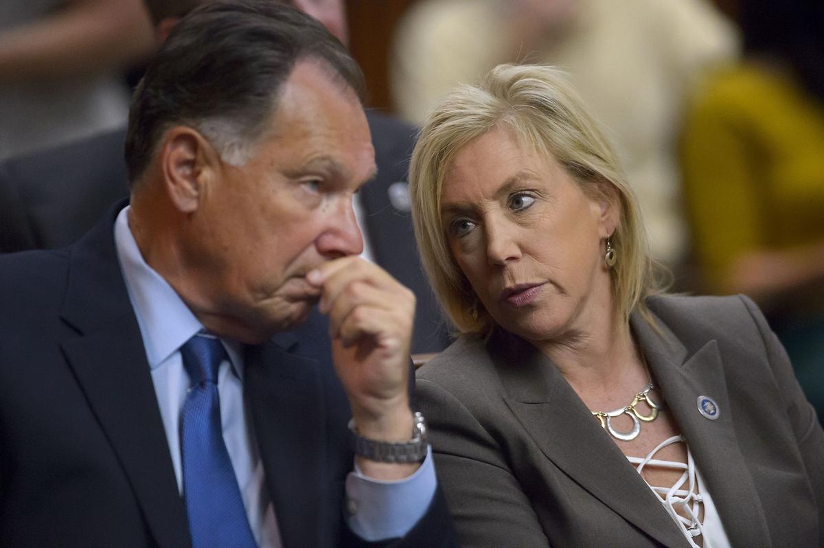 Tony Rackauckas, then the Orange County District Attorney, and then-Sacramento County District Attorney Anne Marie Schubert confer as East Area Rapist Joseph James DeAngelo is arraigned in Sacramento Superior Court in August 2018. Rackauckas attempted to move the trial to Southern California, according to Thien Ho’s account. 