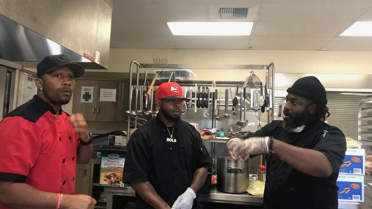 Mike Harris, left, Willis Webster, center, and Berry Accius, right, are founders of 3 Black Chefs.