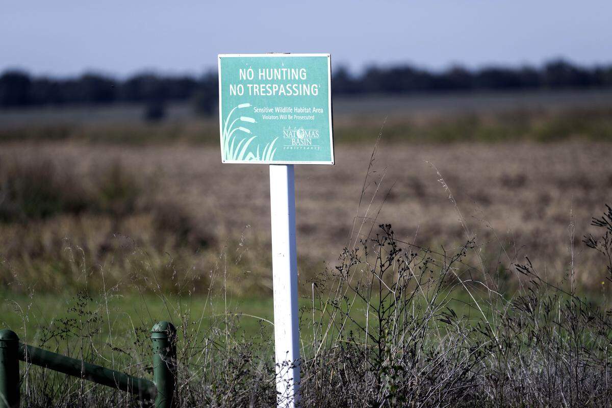 A sign marks the wildlife habitat of the Natomas Basin Conservancy in Sacramento County on Nov. 10.