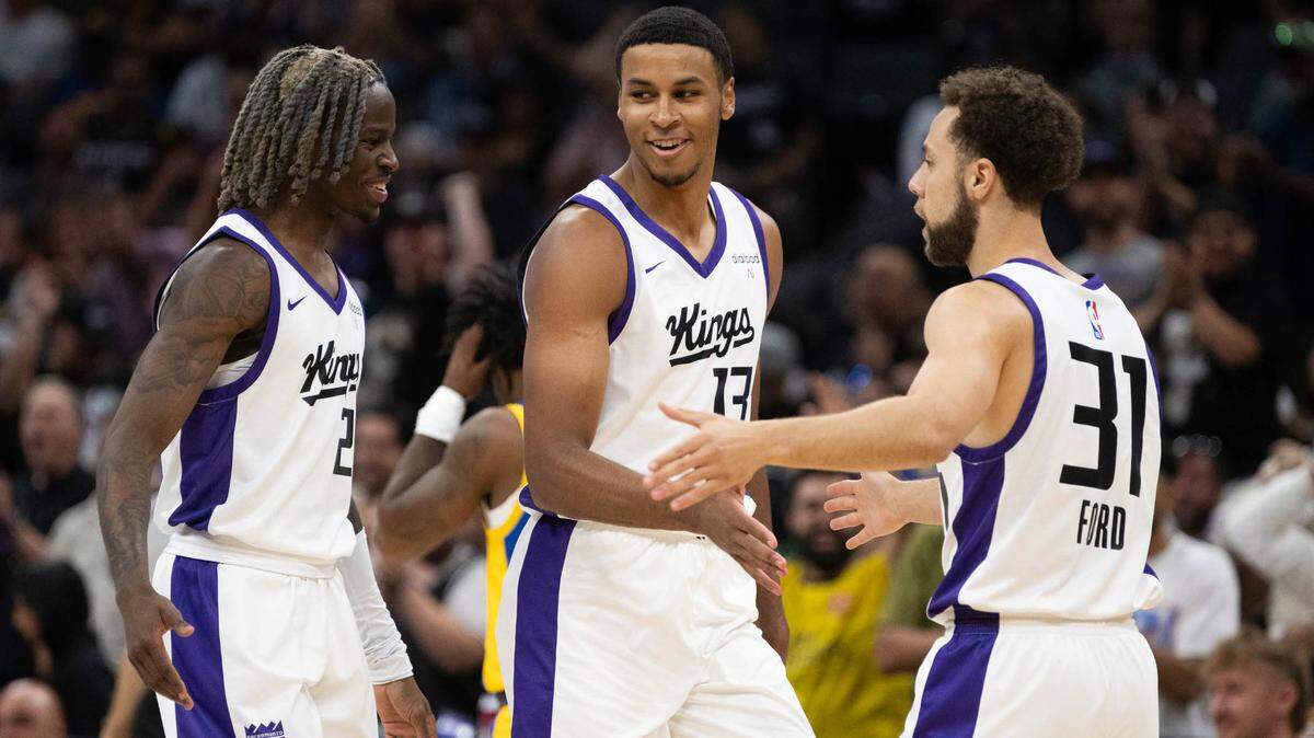 Sacramento Kings Keegan Murray is congratulated by teammates Jordan Ford and Keon Ellis during the California Classic Summer League at Golden 1 Center Monday, July 3, 2023 in Sacramento.