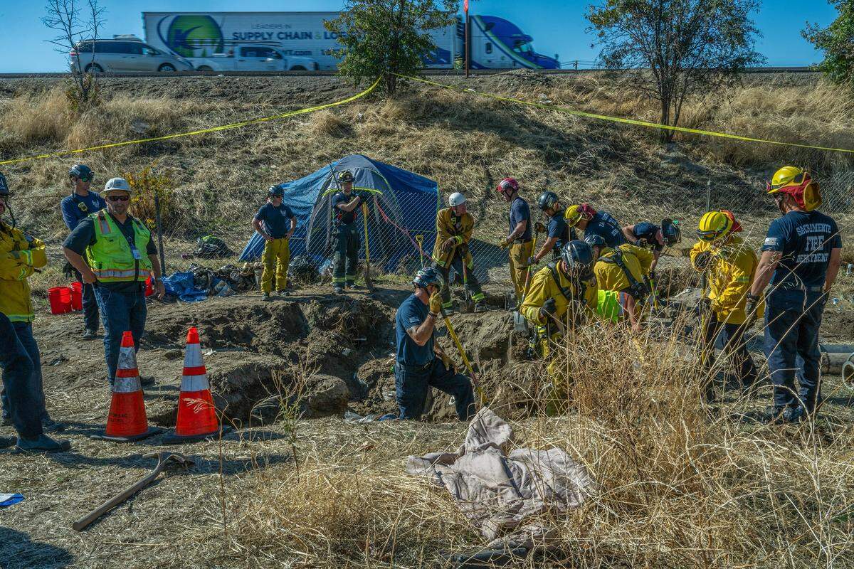 Sacramento firefighters and city workers search a partially collapsed tunnel on Friday in the River District after reports that a homeless man might have been living there. During the search, firefighters found fencing, blankets, sheets, tarps, rugs and clothing, but the man was not found.