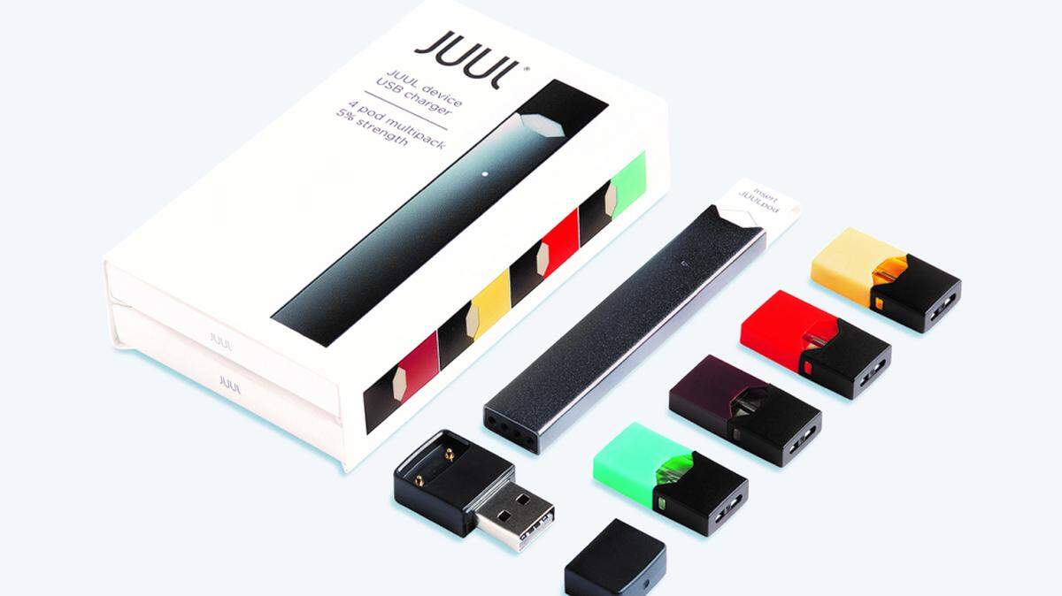 Colorful nicotine-filled pods, pictured on the right, are inserted into the Juul e-cigarette, which educators say looks deceptively like a flash drive, making it harder to identify.