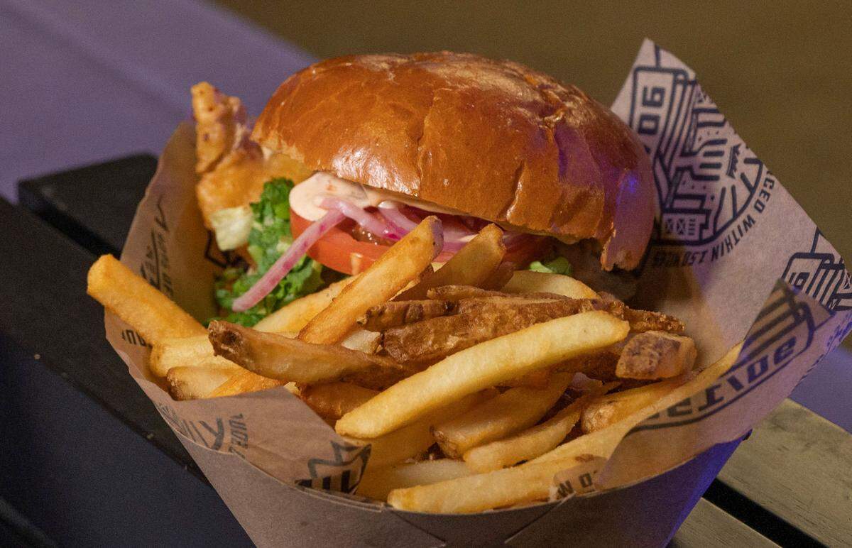 The SK Fish Sandwich from Café Bernardo has beer-battered rock fish with sambal tartar sauce on a brioche bun. It is one of the new Local Eats menu items available at Golden 1 Center for the Sacramento Kings 2022-23 NBA Season.