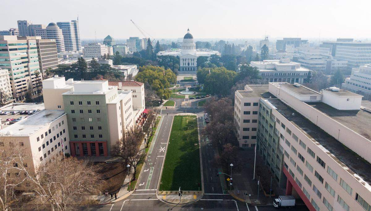 Vacant state office buildings flank Capitol Mall on Friday, Jan. 30, 2026.