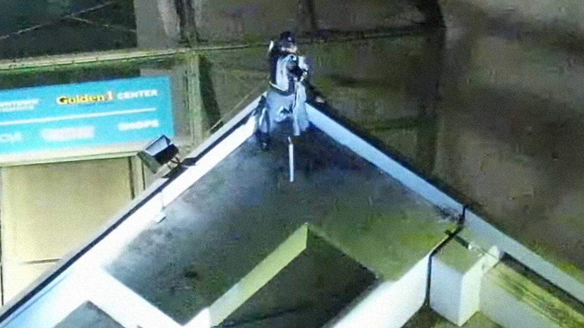 Cleavon Miles is seen pointing a revolver at police officers during a Sept. 7, 2023, standoff atop a downtown parking garage as seen in aerial drone footage provided by the Sacramento Police Department. Police shot and killed Miles after a nearly four-and-a-half-hour standoff when police said Miles pointed the gun at SWAT officers.